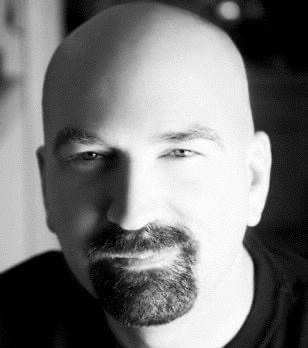 Black-and-white portrait of Derek Beda.